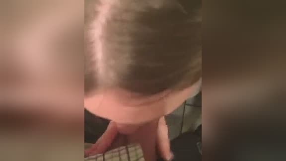 Slut sucking his dick in public restroom
